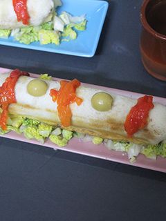 Una foto de Redondo de tortilla de ajos tiernos con jamón