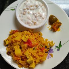 A picture of Pulao recipe in pressure cooker.
