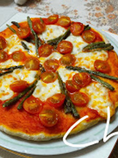 Una foto de Pizza vegetal
