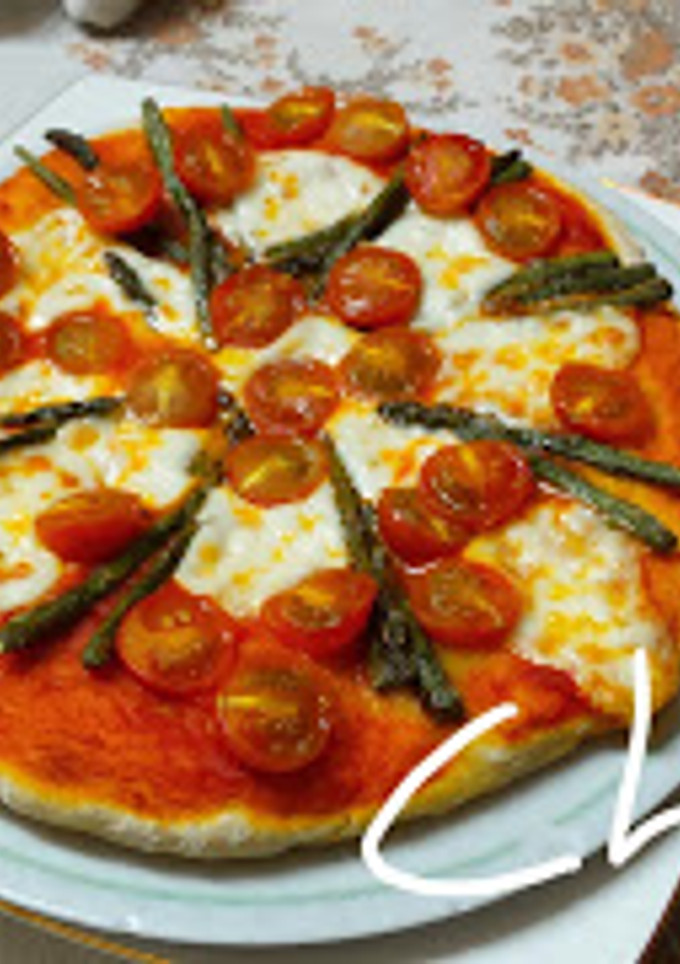 Una foto de Pizza vegetal