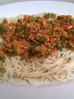 A picture of Qeema and egg noodles.