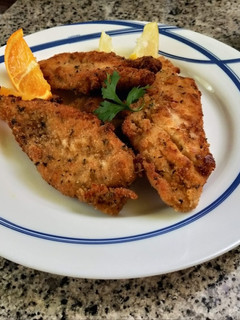 Una foto de Pechugas empanadas especiadas!!