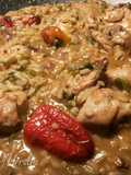 Wok de arroz cremoso con pollo,en salsa de pate y pimientos