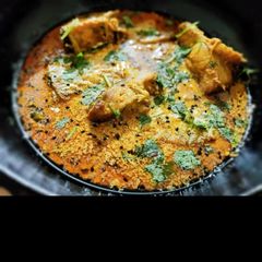 A picture of Fish gravy in mustard seeds sauce.