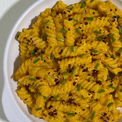 A picture of Fusilli in Carrot Sauce with Chives.