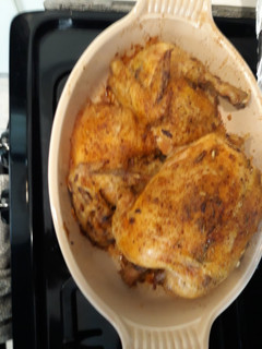 A picture of Dutch Oven Roasted Chicken with wild rice.