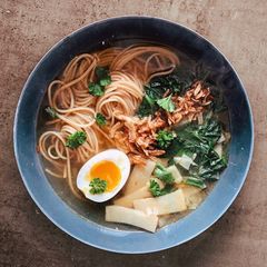 A picture of Ramen Noodles with Bok Choy and Egg.