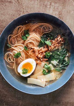 A picture of Ramen Noodles with Bok Choy and Egg.