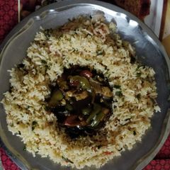 A picture of Chilli Paneer with Fried Rice.
