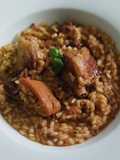 Arroz meloso de costillas, calamares y sofrito de gambas