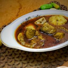 Fish curry with naan A picture of Fish curry with naan.