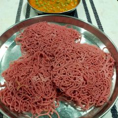 A picture of Beetroot Noolputtu (Idiyappam).