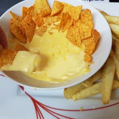 Made Chedder cheese & Onion sauce with tortillas for dipping. 👍 A picture of Made Chedder cheese & Onion sauce with tortillas for dipping. 👍.