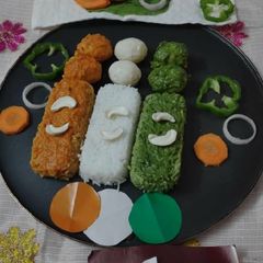A picture of Tricolour Rice with Kashmiri and Hydrabadi Dum Aloo.