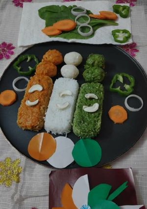 A picture of Tricolour Rice with Kashmiri and Hydrabadi Dum Aloo.