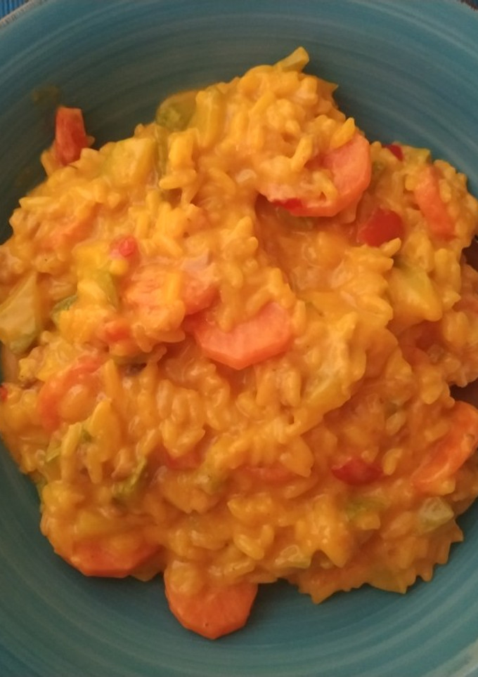 Una foto de Arroz con verduras y salsa de setas
