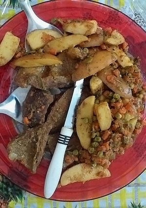 A picture of Restaurant Style Beef Steeks with saucy Vegetables.