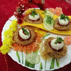 A picture of Paneer veg egg with nest.