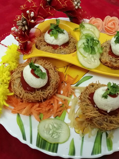 A picture of Paneer veg egg with nest.