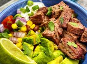 A picture of cherry tomatoes and steak