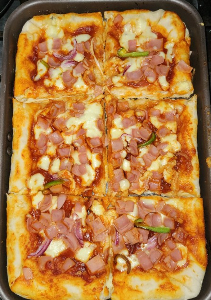 Una foto de Deliciosa pizza casera