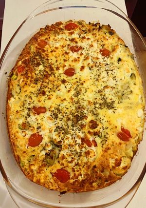 Une photo de Clafoutis tomates courgettes & Feta