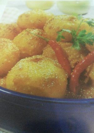 A picture of Dum Aloo Posto In Microwave.