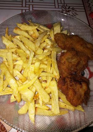 Una foto de Mini milanesas con papas crocantes
