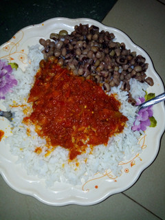 A picture of Rice,beans and stew.