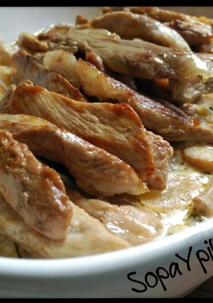 Una foto de Secreto ibérico con champiñones
