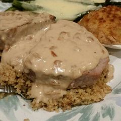 A picture of Brad's tuna steaks over couscous with pan sauce.