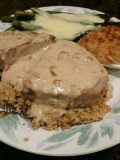 A picture of Brad's tuna steaks over couscous with pan sauce.