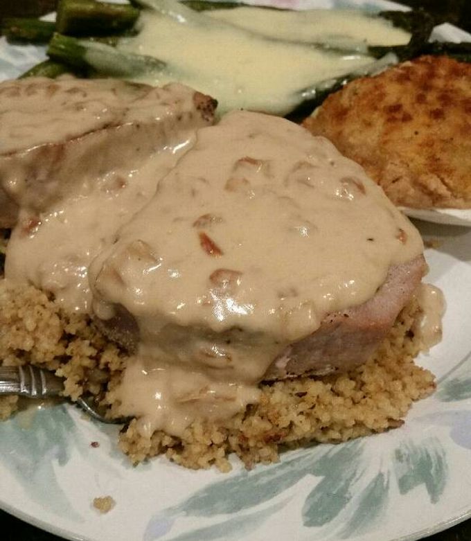 A picture of Brad's tuna steaks over couscous with pan sauce.