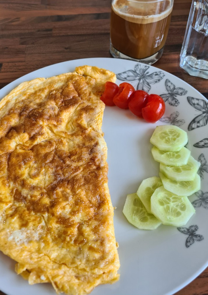Una foto de Tortilla francesa rellena de queso y jamón 🧀