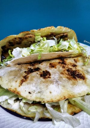 Foto principal de Taco burger de cerdo con mermelada de bacon y cebolla