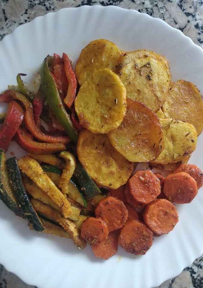 Una foto de Verduras al horno al estilo hindú