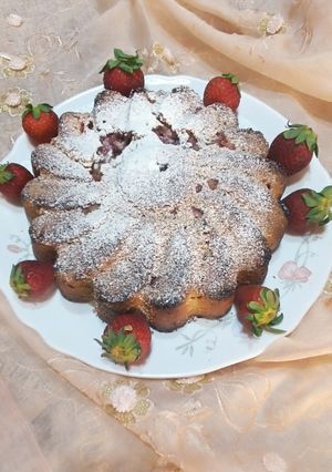 A picture of Strawberry Cake with Almond Flour and Chocolate Chips.