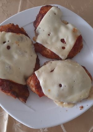 Una foto de Pollo a la parmesana al sartén