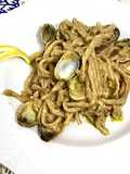 Pici al pesto di pistacchi, con vongole veraci e profumo di limone