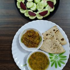 A picture of Palak dal Tori sabji Chapati Salad.