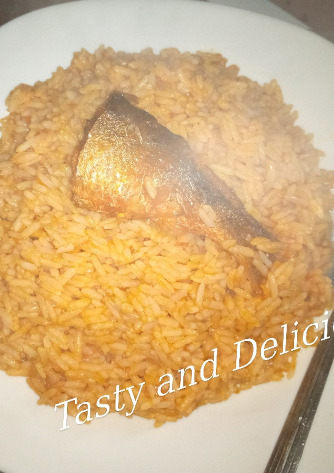A picture of Tasty Jollof Rice with leftover stew.