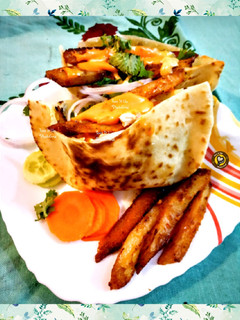 A picture of Chicken Shawarma In Pita Bread.