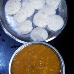 A picture of Sambar with idli.