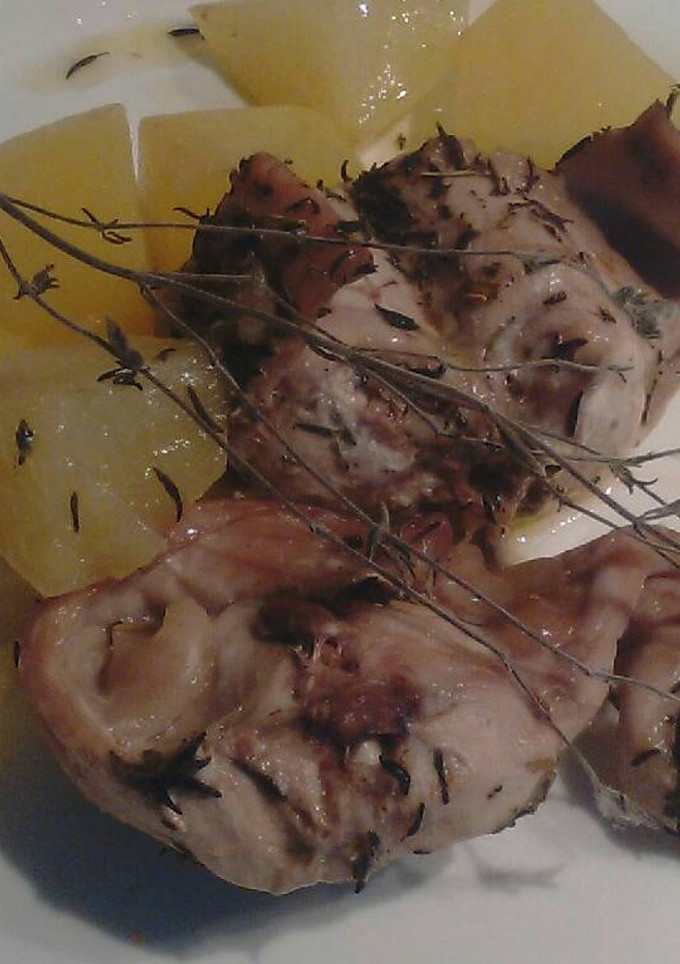 Una foto de Conejo asado con patatas