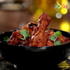 A picture of Chicken Ghee Roast.