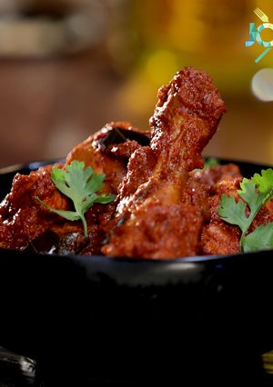 A picture of Chicken Ghee Roast.