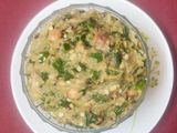 वांग्याचे भरीत कांद्याची पात घालून (Vangyache Bharit Recipe In Marathi)