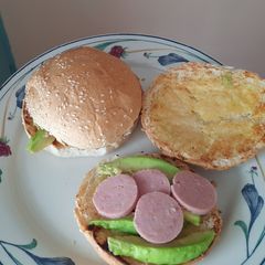 Avocado buns with some nyamabite slices A picture of Avocado buns with some nyamabite slices.