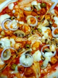 A picture of Chicken Tikka Pizza.