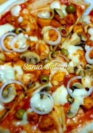 A picture of Chicken Tikka Pizza.